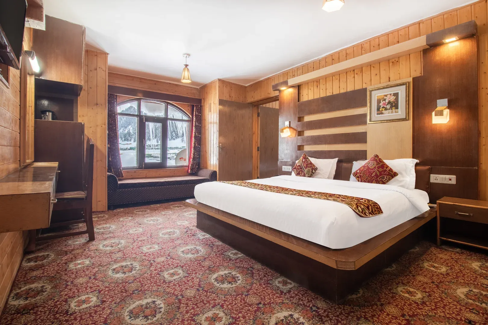 Elegant spacious hotel bedroom interior view.