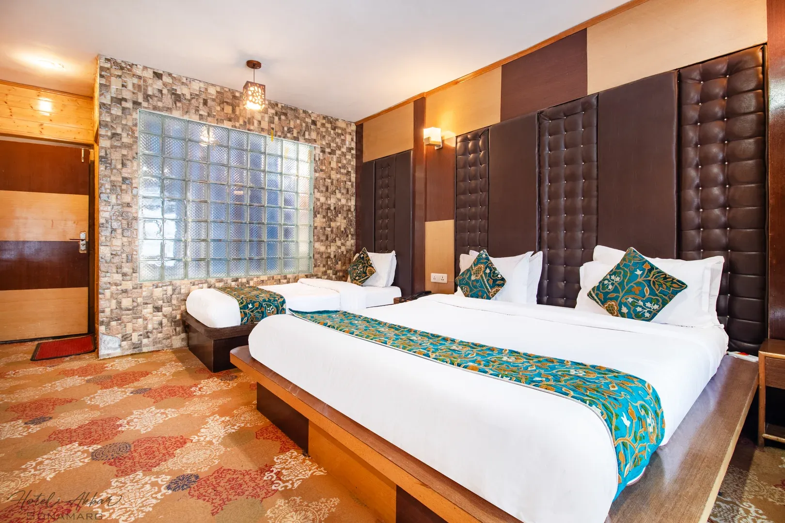Luxurious double bed hotel room interior.