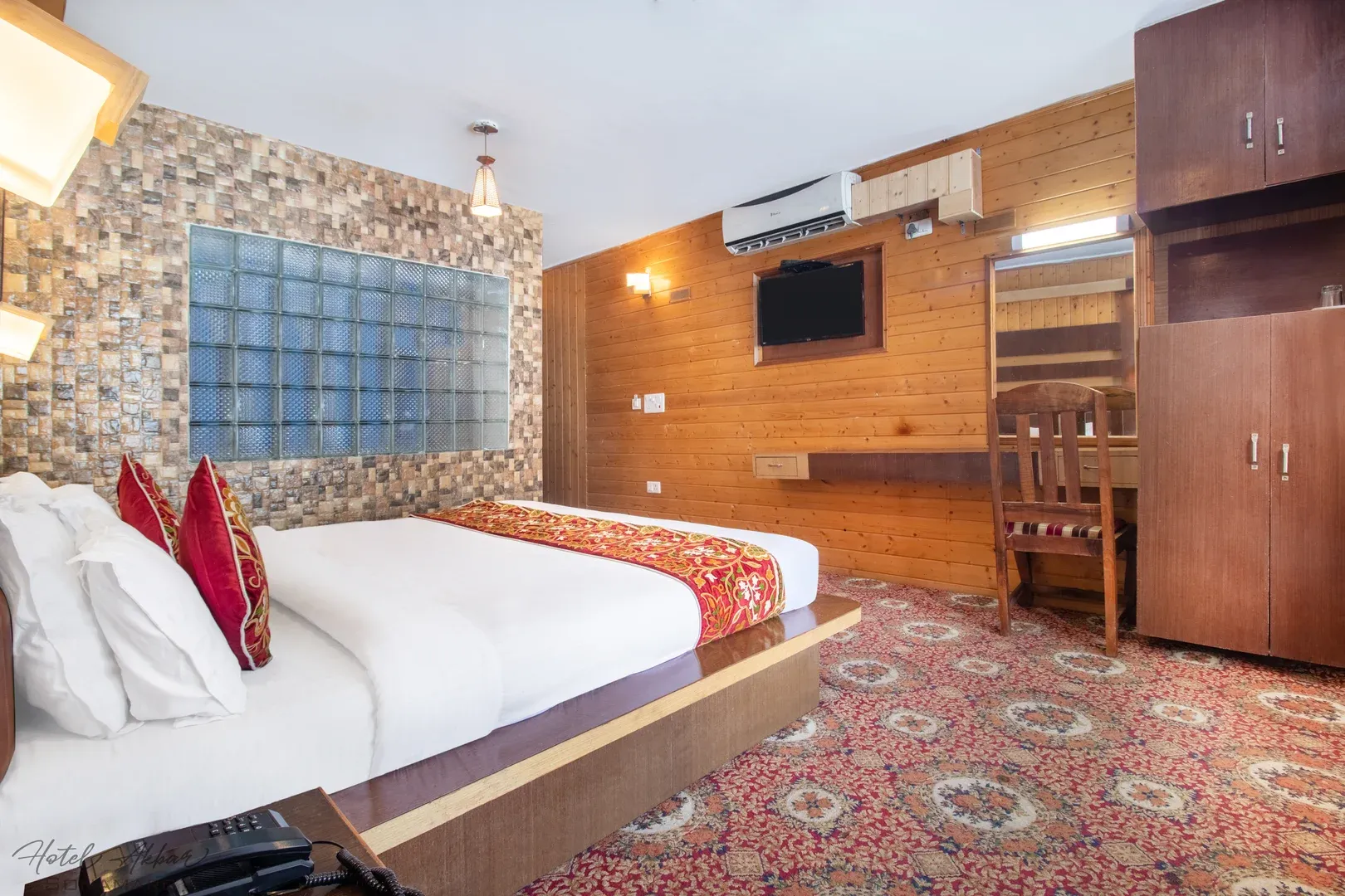 Luxurious Sonmarg hotel bedroom suite decor.