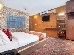 Luxurious Sonmarg hotel bedroom suite decor.